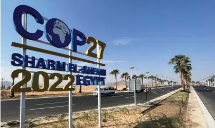  ?? Photograph: Sayed Sheasha/Reuters ?? View of a Cop27 sign on the road leading to Egypt's Red Sea resort of Sharm el-Sheikh. US funding for fossil fuel projects threatens to undercut Joe Biden’s message of climate leadership.