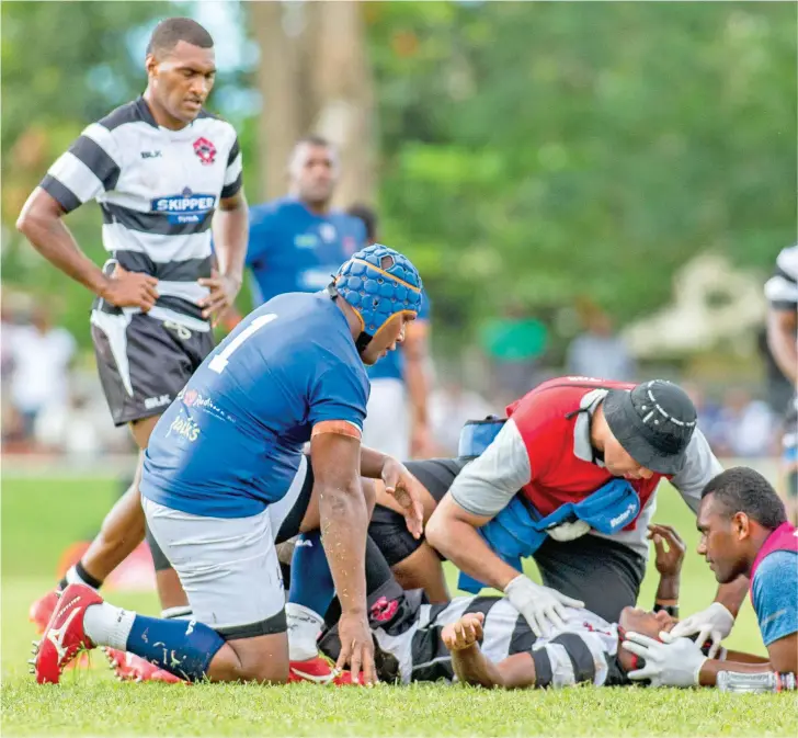  ?? ?? A Rewa player is examined during a match against Suva in the Skipper Cup competitio­n. Photo: FRU Media