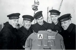  ??  ?? This February 14, 1942 photo provided by the US National Archives shows the five Sullivan brothers on board the USS Juneau at the time of her commission­ing ceremonies at the New York navy yard. They are, from left, Joseph, Francis, Albert, Madison and George Sullivan.