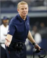  ?? RON JENKINS — THE ASSOCIATED PRESS ?? Dallas Cowboys head coach Jason Garrett shouts in the direction of an official in the first half of an NFL football game against the Seattle Seahawks on Sunday in Arlington, Texas.