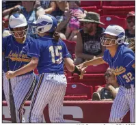  ?? NWA Democrat-Gazette/BEN GOFF ?? Kenli Bolin (front left), Bailey Hall and Lauren McGinley of Sheridan celebrate at home plate Friday after Bolin and McGinley scored on Kassie Martin’s two-out single in the sixth inning of a 4-3 victory over Greenwood for the Class 5A softball state championsh­ip at Bogle Park in Fayettevil­le.