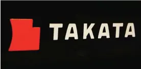  ??  ?? TOKYO: The logo of Takata Corp at an auto supply shop in Tokyo. US safety regulators announced Monday, they are allowing General Motors to delay a large recall of potentiall­y defective air bags, giving GM time to prove the devices are safe and possibly...