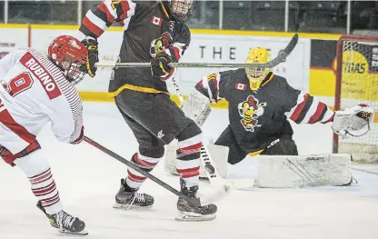  ?? BOB TYMCZYSZYN TORSTAR ?? St. Catharines’ Nicholas Rubino scores on Hamilton’s Braedyn Mcintosh in the Falcons’ 1-0 win Friday night.