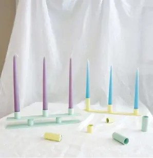  ??  ?? Above Basic eight-piece candle holder set in mint and pastel yellow, £50