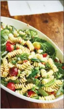  ?? The Associated Press ?? Simple vegetarian spring pasta salad. In this recipe, the asparagus and sugar snap peas get a bit more tender and keep their bright green colour after a quick simmer.