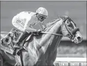  ?? Associated Press vi a Benoit Photo ?? MIKE SMITH led Justify to a victory at the Santa Anita Derby on April 7. Up next: the Kentucky Derby.