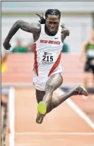  ??  ?? New Mexico’s Warrick Campbell takes off on his winning leap in the triple jump in the MWC championsh­ips Saturday. His went 51 feet, 5 inches.