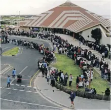  ?? HANNES THIART Independen­t Newspapers ?? PEOPLE queue to vote at the Muizenberg Pavilion, in Cape Town, during the first democratic elections on April 27, 1994. The country was engulfed in euphoria and ecstasy. Thirty years later, we have reasons to celebrate our democracy, but the country is not where it is supposed to be, says the writer. |