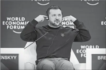  ?? MARKUS SCHREIBER AP PHOTO ?? Ukrainian President Volodymyr Zelenskyy gestures Tuesday after his speech at the Annual Meeting of World Economic Forum in Davos, Switzerlan­d. The annual meeting of the World Economic Forum is taking place in Davos from Jan. 15 to 19.