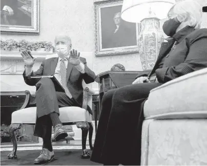  ?? ANDREW HARNIK/AP ?? President Joe Biden meets with Treasury Secretary Janet Yellen for a weekly economic briefing Friday in the Oval Office.