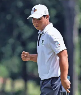  ?? NELL REDMOND/USA TODAY SPORTS ?? Joohyung “Tom” Kim reacts after making a birdie on the ninth hole during the final round of the Wyndham Championsh­ip.