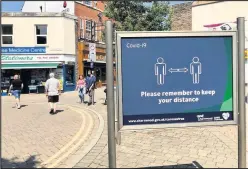  ??  ?? ■ Social distance request in town. Photo courtesy of Charnwood Borough Council