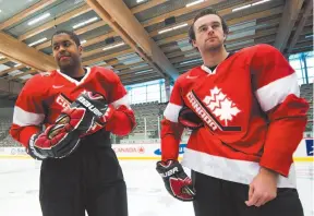  ?? CP FILE PHOTOS ?? Left, Devante Smith-Pelly in 2018. Right, Team Canada forwards Devante Smith-Pelly, left, and Brett Connolly, right, mingle after their annual team photograph as Canada announced the 2011 world juniors roster in Calgary.