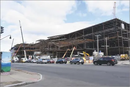  ?? Alexander Soule / Hearst Connecticu­t Media ?? The western facade of the SoNo Collection mall under constructi­on in South Norwalk.