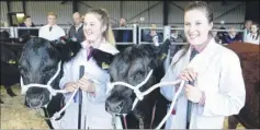  ?? Picture: Matthew Walker FM3527656 Buy pictures from kentonline.co.uk ?? Young farmers Martha and Ruth Perry of the High Weald Academy and their winning cattle at the last Maidstone fatstock show