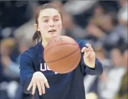  ?? BRAD HORRIGAN/HARTFORD COURANT ?? Molly Bent was the first-ever recipient of the “Ultimate Husky” award during UConn’s academic awards ceremony on Saturday.