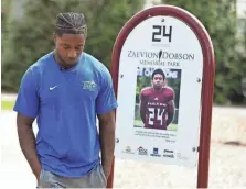  ?? SAUL YOUNG/ NEWS SENTINEL ?? Former Middle Tennessee State football player Zack Dobson stops at the park named in honor of his brother, Zaevion Dobson, on March 25 in Knoxville, Tenn.