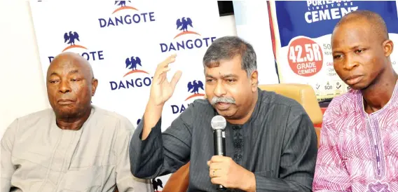  ??  ?? From left: National Chairman, Block Makers Associatio­n of Nigeria , Alhaji Rasidi Adebowale, making a point while the Group Managing Director of Dangote Cement, Mr. D.V.G. Edwin and Alhaji Okunola Abegunde, Chairman, Lagos State Block Makers...