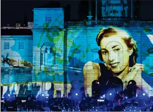  ??  ?? WALL OF STRENGTH: Images are projected on to Horse Guards Parade last night as part of a BBC tribute