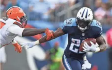  ??  ?? CHRISTOPHE­R HANEWINCKE­L, USA TODAY SPORTS DeMarco Murray, right, has emerged as the Titans’ bell-cow running back, getting a much greater load than Derrick Henry.