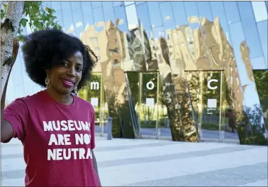  ?? TONY DEJAK — THE ASSOCIATED PRESS ?? La Tanya Autry, a curatorial fellow at The Museum of Contempora­ry Art Cleveland, poses outside of the museum in Cleveland on Thursday, Oct. 8, 2020. Museums are being called on to examine what’s on their walls amid a national reckoning on racism. Among 18 major U.S. museums, 85% of artists featured are white, while 87% are men, according to a 2019 study conducted at Williams College. Autry helped start an initiative called Museums Are Not Neutral.