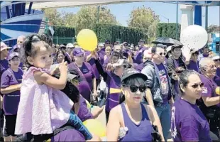  ??  ?? THE TENTATIVE contract agreement reached by Walt Disney Co. and four Disneyland Resort unions applies to about a third of the resort’s 30,000 staffers. Above, a July 3 protest.