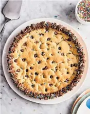  ?? JOE LINGEMAN ?? Making a massive cookie cake can be a fun baking project to do when you’re stuck at home.