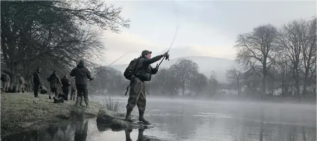  ?? JEFF J. MITCHELL/ GETTY IMAGES FILES ?? FishBrain’s app has 650,000 users who record their catches, creating a database that, together with data such as wind speed and water temperatur­e, allows the app to predict where fi sh will bite.