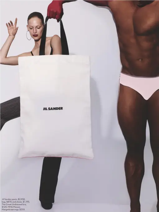  ??  ?? Jil Sander pants, $2,930, bag, $870, and shoes, $1,195. The Great Undressed bra, $125. MM6 Maison Margiela earrings, $255.