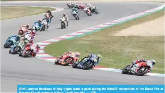  ??  ?? BRNO: Andrea Dovizioso of Italy (right) leads a pack during the MotoGP competitio­n of the Grand Prix at Masaryk Circuit yesterday in Brno, Czech Republic. — AFP