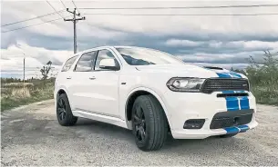  ?? CHRIS D’ALESSANDRO WHEELS.CA ?? If you’re dreaming of a muscle car but need to do family tasks, the Durango SRT may be for you.