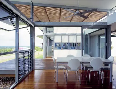  ??  ?? 02 Galvanized steel portal frames offer a clear expressed structure and a sense of lightness. Photograph: Shannon McGrath.
03 The living spaces embrace the ocean horizon and breezes filter through the openable glazed edges.
02