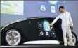  ?? By Yoshikazu Tsuno, Afp/getty Images ?? High-tech: A Toyota Fun-vii threeseate­r can change its appearance.