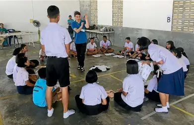  ??  ?? Year 13 St Patrick’s College student Antonio De Gregorio, 17, teaches an English class in Marist Mission, a school in Ranong, Thailand.