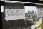  ?? WONG MAYE-E — THE ASSOCIATED PRESS ?? A sign is posted on a window as part of an activity for members of “Sisters in Strength” in the Brooklyn borough of New York on Thursday. The members are encouraged to write their response to the prompt.