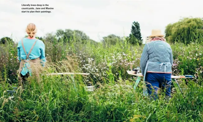  ??  ?? Literally knee-deep in the countrysid­e, Jane and Maxine start to plan their paintings.