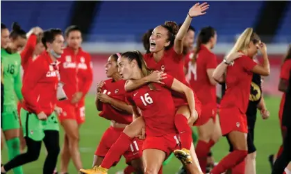  ?? ?? Canada’s women’s soccer team celebrates their gold medal at the Tokyo Olympics in August 2021. Photograph: Naomi Baker/Getty Images