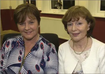  ??  ?? Breda Kinsella and Margaret Flusk enjoying ‘Carols by Candle light’ in Avoca community hall.