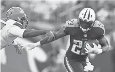  ?? CHRISTOPHE­R HANEWINCKE­L, USA TODAY SPORTS ?? DeMarco Murray, right, has emerged as the Titans’ bell- cow running back, getting a much greater load than Derrick Henry.