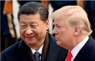  ?? — AP ?? Xi Jinping had an ‘extremely positive’ phone conversati­on with Donald Trump about trade and other issues, the Chinese foreign ministry said on Friday.
