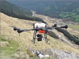  ?? ?? Drones have been trialled to plant trees above the Rest and be Thankful.