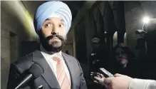  ?? JUSTIN TANG, CANADIAN PRESS ?? Minister of Innovation Navdeep Bains has ordered a public inquiry into the sales practices of the big telecoms.