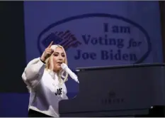  ?? AP PHOTO/ANDREW HARNIK ?? In this November 2020 file photo, Lady Gaga performs during a drive-in rally for then Democratic presidenti­al candidate former Vice President Joe Biden at Heinz Field in Pittsburgh. Lady Gaga will sing the national anthem at Joe Biden’s presidenti­al inaugurati­on on the West Front of the U.S. Capitol when Biden is sworn in as the nation’s 46th president next Wednesday.