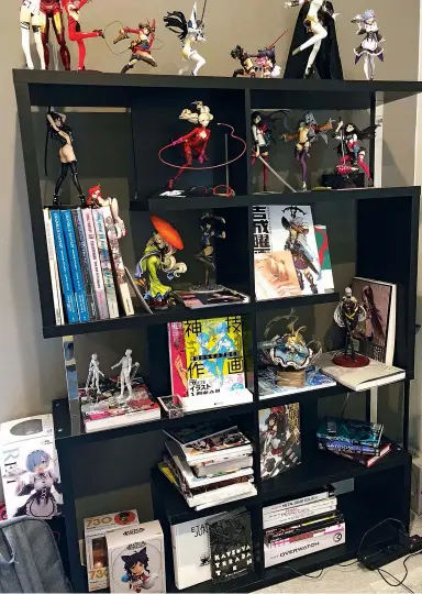  ??  ?? This artsy-looking bookshelf is home to my favourite art books and Japanese figurines.