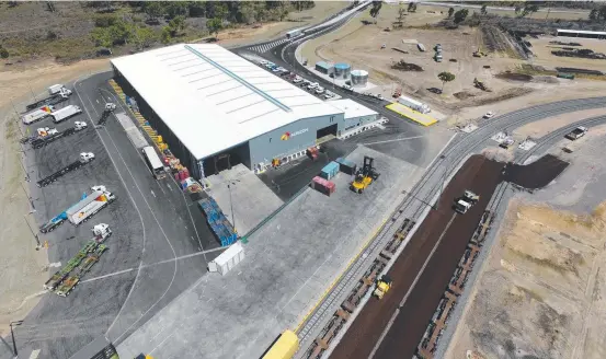  ?? WELL CONNECTED: An aerial view of Aurizon's new freight distributi­on centre in the Townsville State Developmen­t Area at Stuart. Picture: SUPPLIED ??