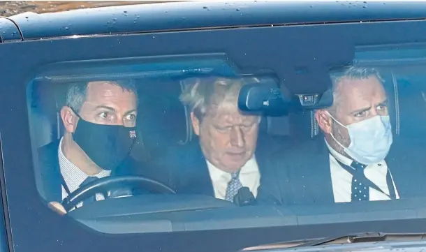  ?? ?? UNDER SIEGE: Prime Minister Boris Johnson, centre, makes a fast exit from the House of Commons as anger grows over parties at Downing Street.