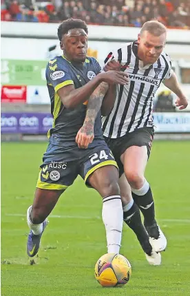  ?? ?? Eyes down Jonathan Afolabi is caught by Mark Connolly but Ayr’s penalty calls were waved away