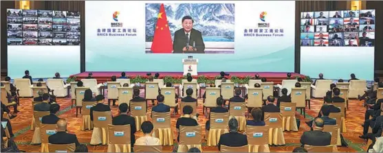  ?? YIN BOGU / XINHUA ?? President Xi Jinping delivers the keynote speech via video link from Beijing at the opening ceremony of the BRICS Business Forum on June 22.