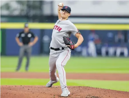  ?? JOSHUA BESSEX, THE ASSOCIATED PRESS ?? Red Sox starter and Victoria native Nick Pivetta unloads to the plate during the first inning against the Blue Jays on Monday in Buffalo. Pivetta pitched into the seventh inning to earn his first career victory over Toronto.