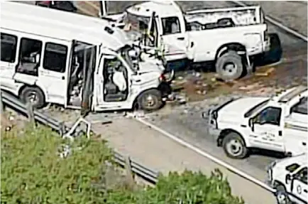  ?? PHOTO: REUTERS ?? A still image of aerial video shows an accident scene involving a Texas church bus carrying senior citizens which crashed head-on with another vehicle about 130km west of San Antonio, Texas.